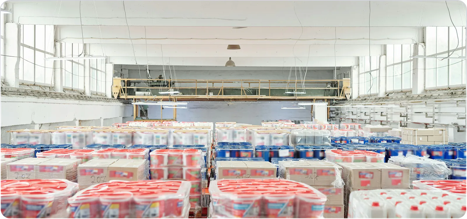 Beverage warehouse with pallets of drinks cases